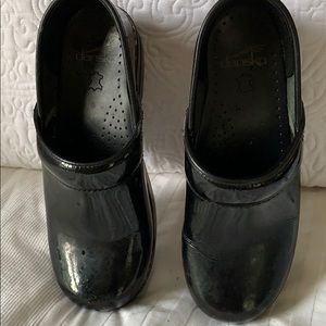 Dansko patent leather clogs